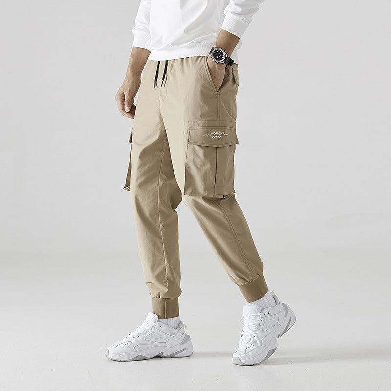 Pantalon ample tendance à neuf jambes fendues, pantalon décontracté respirant à poches multiples