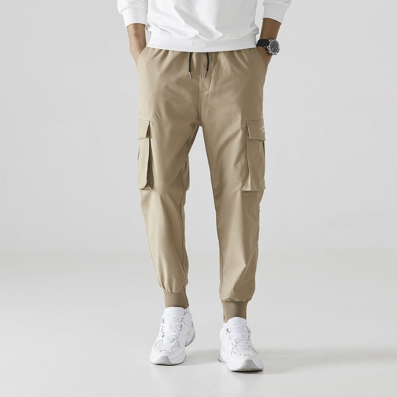 Pantalon ample tendance à neuf jambes fendues, pantalon décontracté respirant à poches multiples