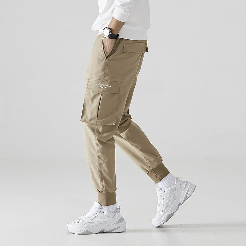 Pantalon ample tendance à neuf jambes fendues, pantalon décontracté respirant à poches multiples